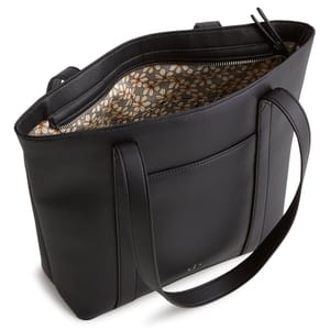 Black leather tote bag with dual handles, featuring a floral pattern interior lining and an exterior pocket.