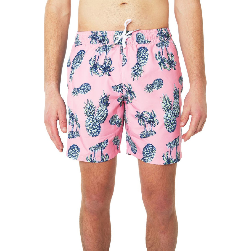 Pink swim trunks with a blue pineapple and palm tree print, featuring a white drawstring and elastic waistband.