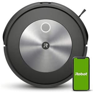 A round, sleek iRobot Roomba robot vacuum features a central metallic finish with a logo, accompanied by a smartphone displaying the iRobot app, likely indicating smart connectivity and remote control capabilities.