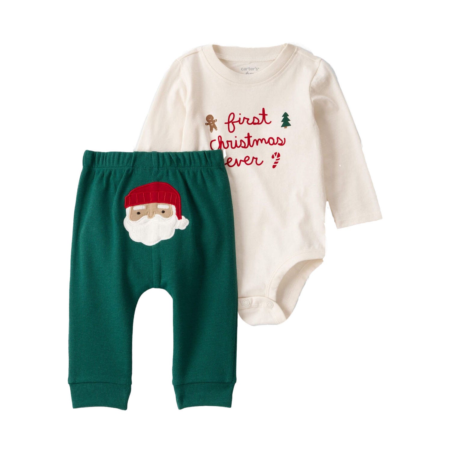 Baby outfit set featuring a cream long-sleeve bodysuit with \“first christmas ever\“ text and festive icons, paired with green pants displaying a Santa face on the back.