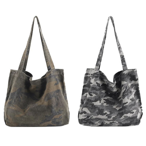 Two camo tote bags with long handles, one in green camo and the other in gray camo.