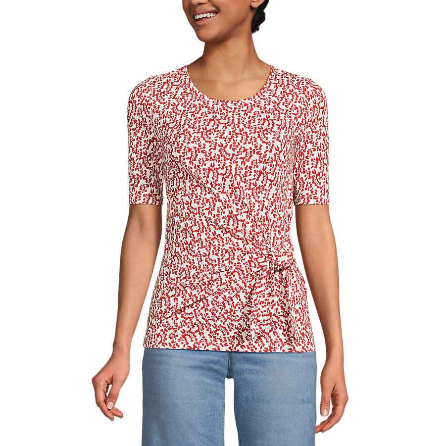 Lands' End Tie-Front Top features a red and white abstract pattern, short sleeves, and a tie detail on the side. Paired with jeans, it offers a casual yet stylish look.
