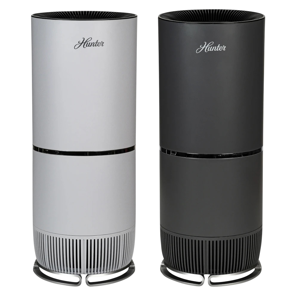 Two cylindrical HEPA tower air purifiers, one in white and the other in black, with vented bases and top air outlets, featuring the \“Hunter\“ logo on the front.