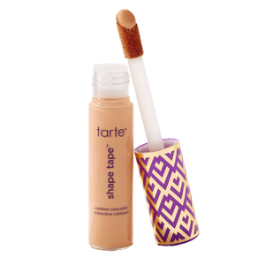 Tarte Shape Tape Concealer features a tube with a purple and gold geometric-patterned cap and a doe-foot applicator, designed for contouring and concealing.