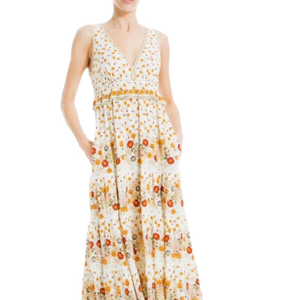 A sleeveless, floral-patterned maxi dress with a V-neck and peplum design. It features warm autumn hues and an A-line silhouette with hidden pockets for added functionality.