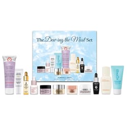 The \“Dew-ing the Most Set\“ includes skincare products like First Aid Beauty KP Bump Eraser, Sunday Riley Good Genes, Clarins cream, Philosophy moisturizer, Prada cream, Lancôme Génifique, Kiehl's Ultra Facial Cream, Sulwhasoo, and Kopari moisturizer.