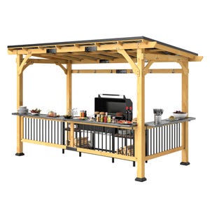 A wooden outdoor kitchen gazebo features a built-in grill and countertop space with various food items and utensils. The structure has a metal roof and lower storage space, ideal for backyard barbecues.