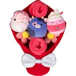 A plush bouquet featuring three cute, round stuffed animals, including a pink mushroom, a purple cow, and a pink drink, wrapped in a red and pink arrangement with a sparkly silver bow.