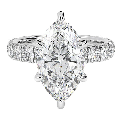 A marquise-cut diamond ring with additional round diamonds set into the band, all in a polished silver or white gold setting.
