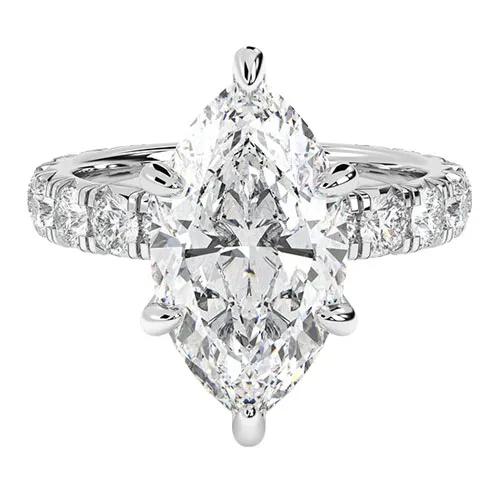 A marquise-cut diamond ring with additional round diamonds set into the band, all in a polished silver or white gold setting.