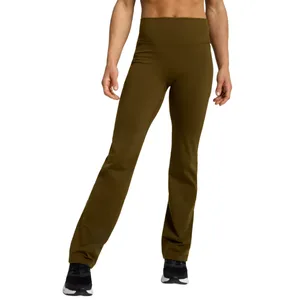 High-waisted olive green flare leggings paired with black and white athletic shoes.