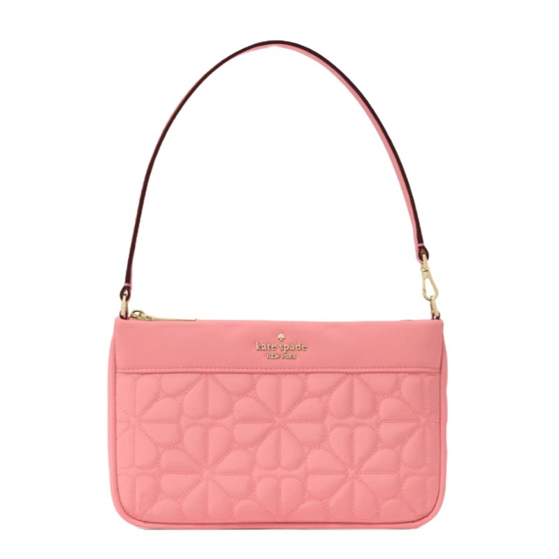 Pink Kate Spade shoulder bag with a floral quilted pattern and a gold-tone logo.