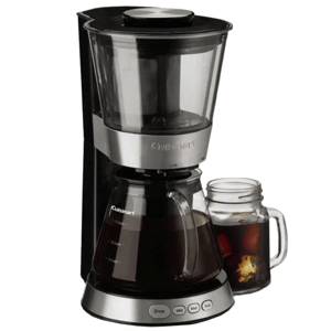 Cuisinart cold brew coffee maker with a glass carafe at the bottom and a transparent top for brewing, alongside a mason jar filled with iced coffee.