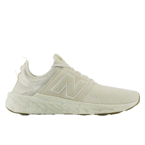 Beige-colored New Balance Women's Fresh Foam running shoes featuring a mesh upper, cushioned Fresh Foam midsole, and distinctive \“N\“ logo on the sides.