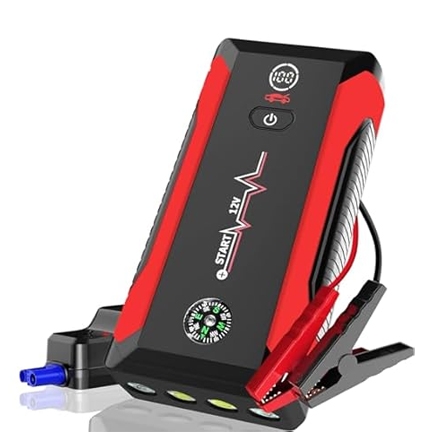 Portable car jump starter with attached clamps and a compass, featuring USB outputs and an LED display for battery status.