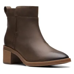 Brown ankle boot with a low stacked heel and smooth, rounded toe, featuring a pull tab at the back and minimal stitching details.