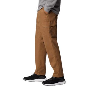 Brown cargo pants paired with black sneakers and a gray sweatshirt.