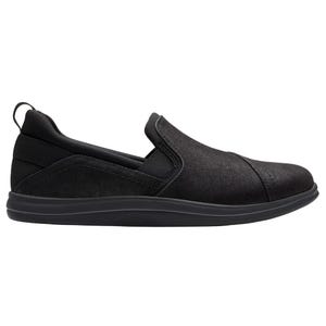 A black slip-on shoe with a low-profile design, featuring a soft upper and a cushioned sole for comfort.
