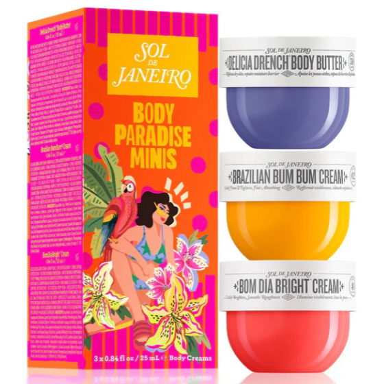 A vibrant gift set featuring three Sol de Janeiro body creams in colorful containers, labelled 'Brazilian Bum Bum Cream', 'Bom Dia Bright Cream', and 'Beija Flor™ Elasti-Cream'.