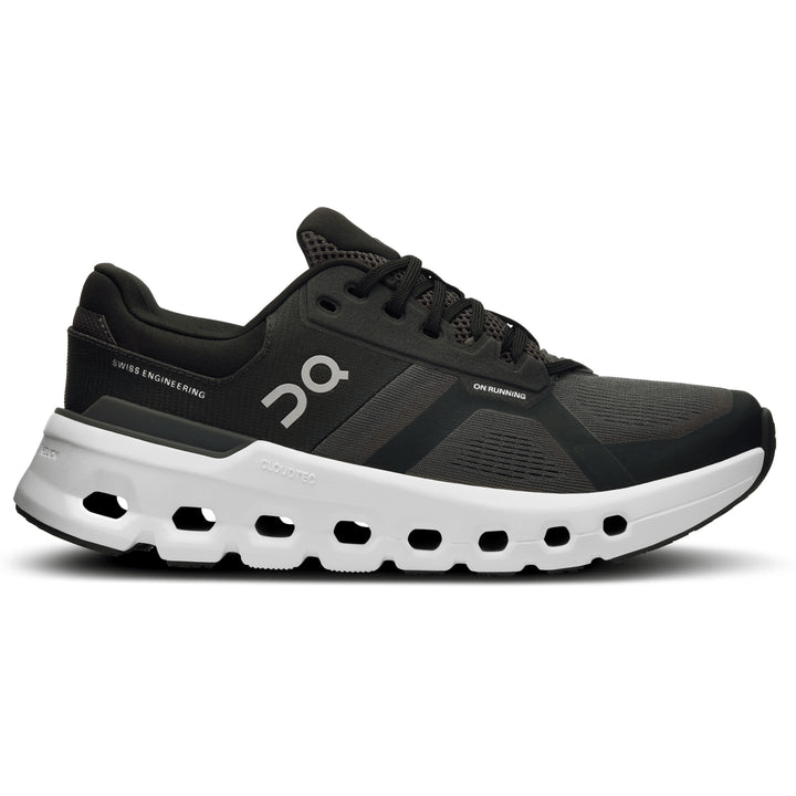 A black running shoe with \“Swiss Engineering\“ and \“On Running\“ logos, featuring a distinctive white CloudTec sole with multiple open cutouts for cushioning and support.