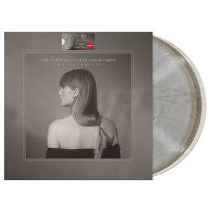 Vinyl record of \“The Tortured Poets Department: The Anthology\“ featuring a grayscale cover with a side profile of a woman. The set includes a marbled clear vinyl and a poster matching the album artwork.