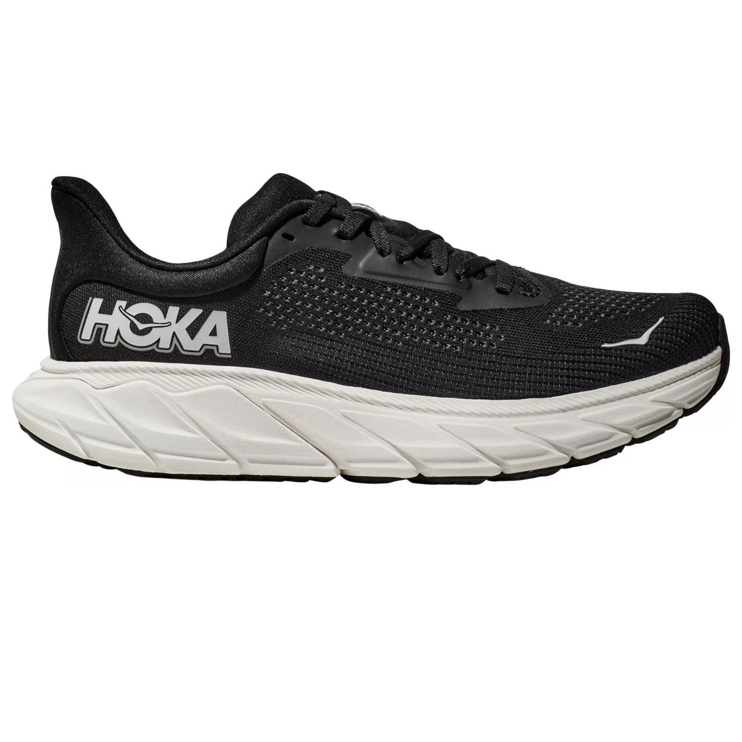 Black Hoka Arahi 7 running shoes with a thick, white cushioned sole and the Hoka brand logo displayed on the side and tongue.