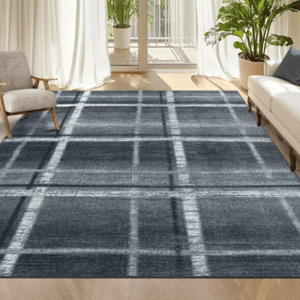 A living room features a checked dark gray rug, an armchair with wooden legs, a white sofa with a dark cushion, and a large potted plant by a window with white curtains.