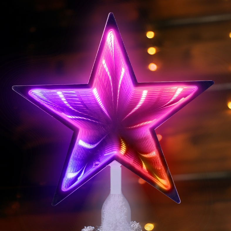 A glowing star-shaped Christmas tree topper with purple and pink lighting effects radiates against a darker backdrop.