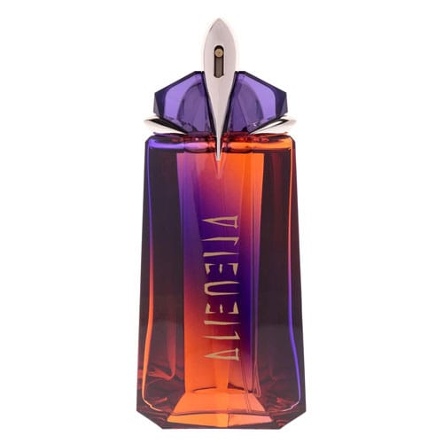 A perfume bottle with a striking design featuring a gradient of purple and orange hues and a unique, angular shape.