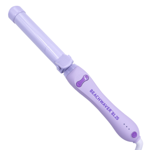 A purple Beachwaver B1.25 curling iron with a rotating barrel and adjustable temperature settings.