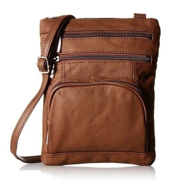 A brown leather crossbody bag featuring three zippered compartments and an adjustable strap. The bag has a textured finish, offering multiple sections for organization.