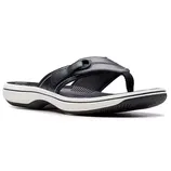 Black flip-flop sandal with a contoured footbed, white and black sole, and a fabric strap featuring a decorative loop detail.