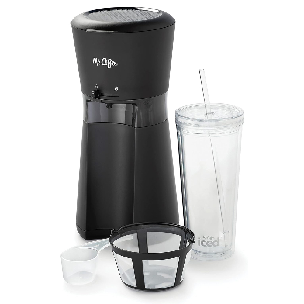 Mr. Coffee branded iced coffee maker accompanied by a reusable tumbler and a measuring scoop.