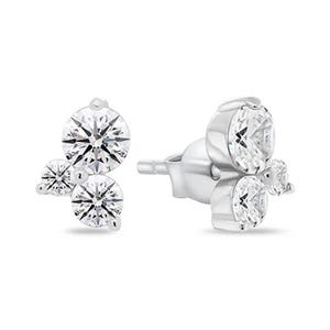 Pair of stud earrings featuring three round, clear stones in a cluster design, set in a silver-tone metal.