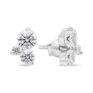 Pair of stud earrings featuring three round, clear stones in a cluster design, set in a silver-tone metal.