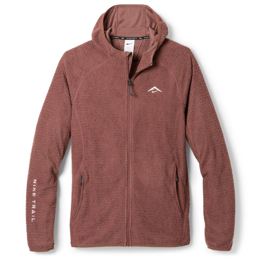 A brown fleece zip-up hoodie with a hood, featuring \“Nike Trail\“ branding on the left sleeve and a small logo on the chest.