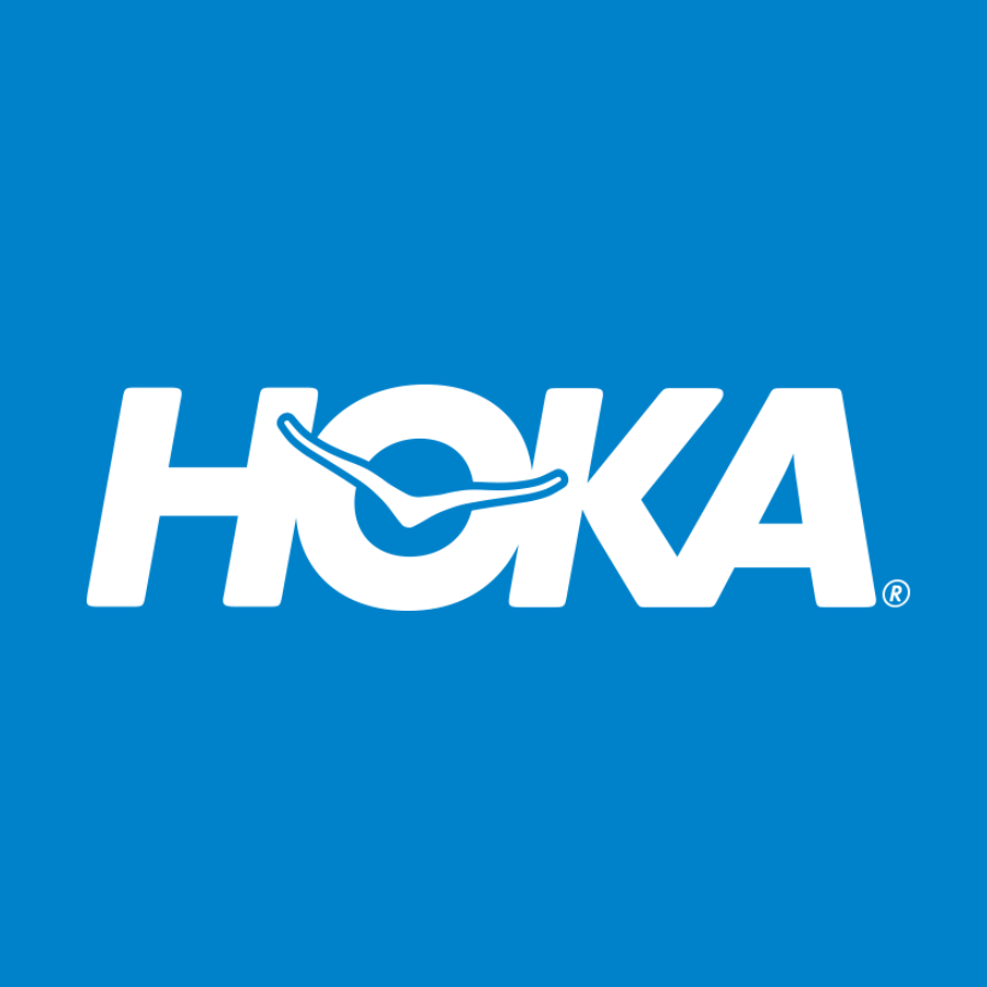 HOKA logo, known for athletic footwear and apparel, featuring bold white text on a blue background with an abstract silhouette.