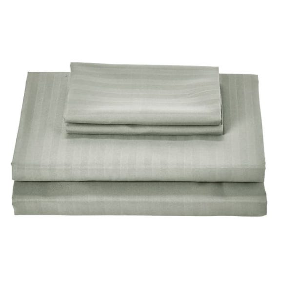Kathy Ireland 6-piece sheet set, featuring a subtle striped pattern, includes a flat sheet, fitted sheet, and four pillowcases in a light sage color.