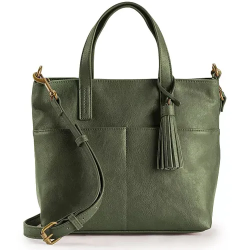 A green leather tote bag with dual handles, a detachable crossbody strap, and a tassel accent.