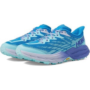 A pair of blue and light aqua sports shoes with the Hoka brand visible on the side.