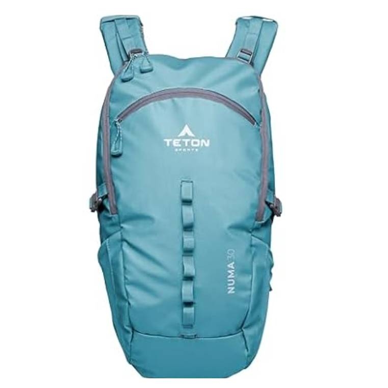A teal Teton Sports Numa 20 technical backpack featuring a large main compartment, exterior loops for gear attachment, and padded adjustable shoulder straps. Ideal for hiking and outdoor activities.