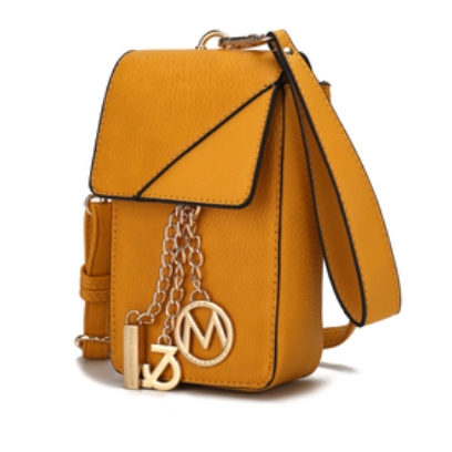 A mustard yellow, crossbody leather bag with a flap closure and accented by gold-tone charms and chain detailing.