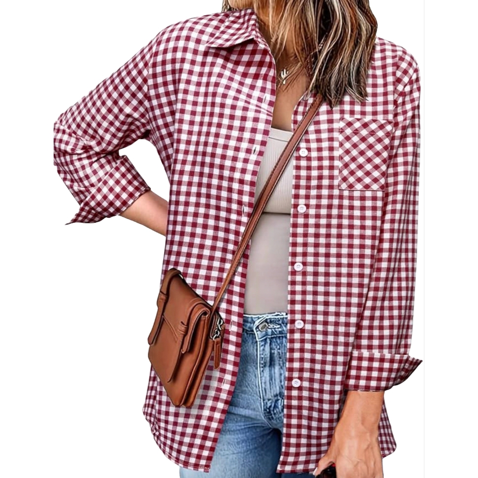 A woman wears a checkered red and white button-up shirt over a beige tank top, paired with jeans and a brown crossbody bag.