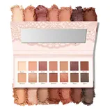 An eyeshadow palette featuring twelve shades in warm, earthy tones, ranging from light beige to deep brown, with a mix of matte and shimmer finishes, and each shade labeled with regal-themed names.