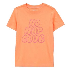 Orange toddler t-shirt with the phrase \“NO NAP CLUB\“ printed in pink bubble letters across the front.