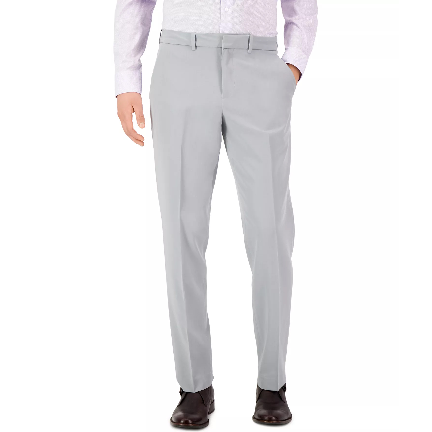 Light gray dress pants paired with a light-colored dress shirt and dark brown shoes.
