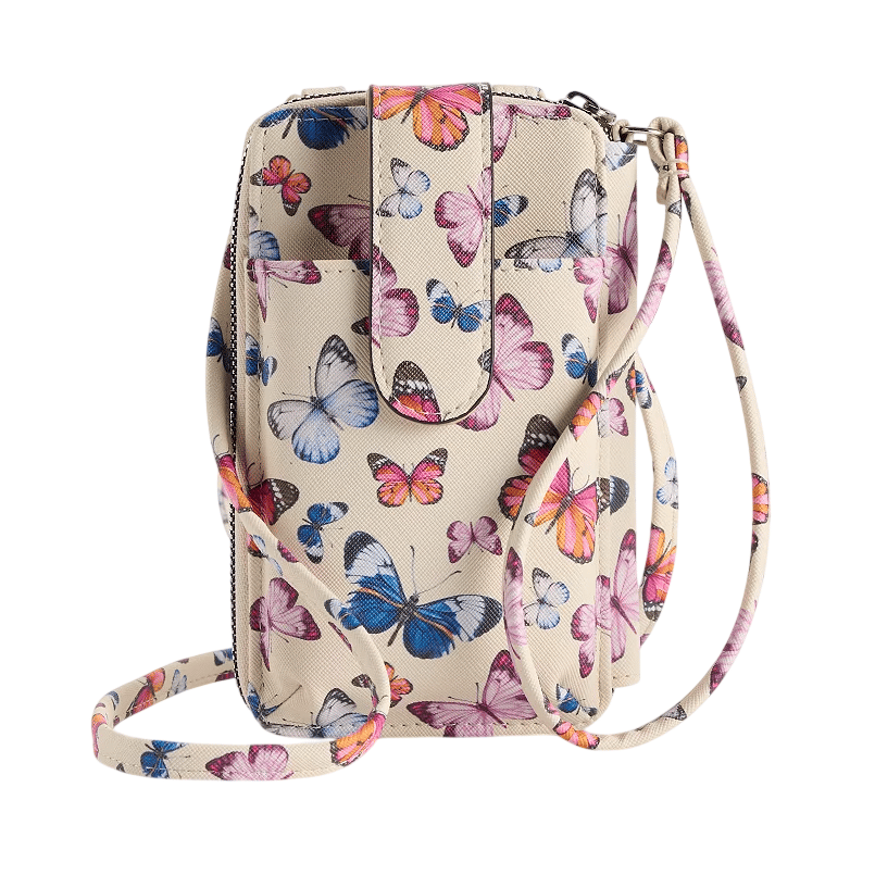 A small crossbody bag with a colorful butterfly pattern on a beige background features a snap closure and an adjustable strap.