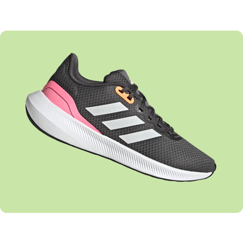 Gray athletic shoe with white stripes, pink heel accent, and orange eyelet on a light green background.