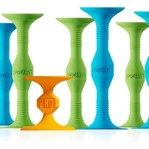 Colorful suction cup toys labeled \“PopDarts,\“ featuring green, blue, and one distinct orange design marked \“Pro.\“