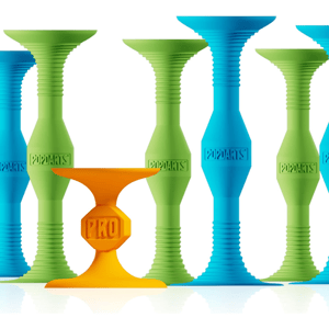 Colorful suction cup toys labeled \“PopDarts,\“ featuring green, blue, and one distinct orange design marked \“Pro.\“
